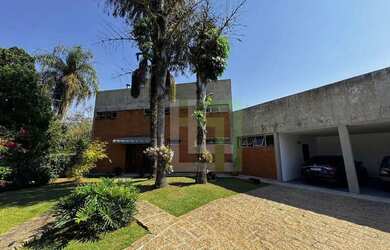 Imagem: A casa possui 5 Dormitórios, 5 Banheiros, 5 Vagas na garagem