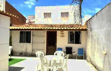 Imagem: A casa possui 2 Dormitórios, Acomodam 15 pessoas, 3 Vagas na