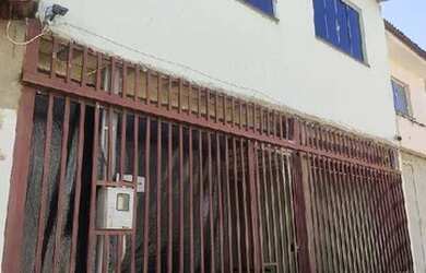 Imagem: A casa possui 3 Dormitórios, 2 Banheiros, 3 Vagas na garagem