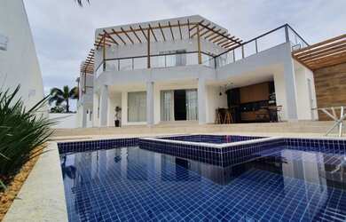 Imagem: A casa possui 5 Dormitórios, 5 Banheiros, 3 Vagas na garagem