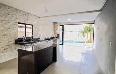 Imagem 12: Casa de condomínio para venda possui 215 metros quadrados com 4 quartos