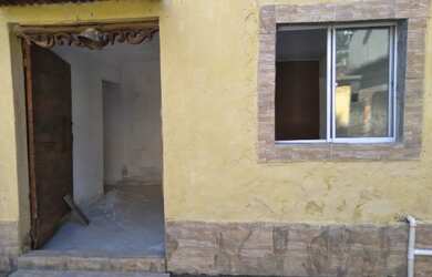 Imagem: A casa possui 2 Dormitórios, 1 Banheiro e está localizado