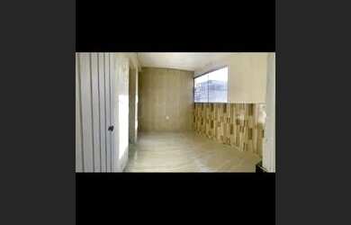 Imagem: A casa à venda possui 4 Dormitórios, 3 Banheiros e 200m²