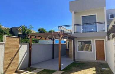 Imagem: A casa possui 3 Dormitórios, 4 Banheiros, 3 Vagas na garagem