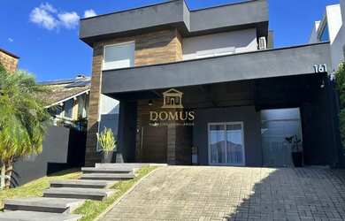 Imagem: A casa em condomínio possui 3 Dormitórios, 5 Banheiros, 2