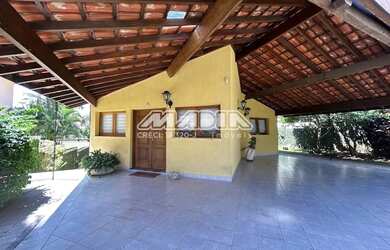 Imagem: A casa em condomínio possui 4 Dormitórios, 4 Banheiros, 5