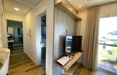 Imagem: O apartamento possui 2 Dormitórios, 1 Banheiro, 1 Vaga na garagem