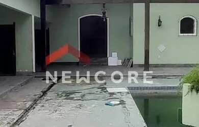 Imagem: A casa possui 3 Dormitórios, 4 Banheiros, 4 Vagas na garagem