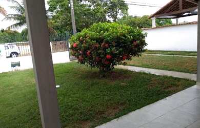 Imagem: A casa possui 3 Dormitórios, 3 Banheiros, 2 Vagas na garagem