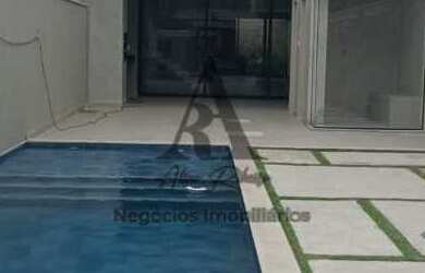 Imagem: A casa em condomínio possui 4 Dormitórios, 5 Banheiros, 2