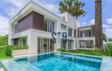 Imagem: A casa em condomínio possui 4 Dormitórios, 5 Banheiros, 5