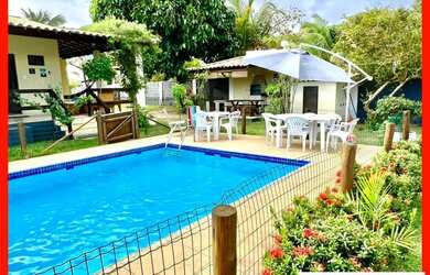 Imagem: A casa possui 4 Dormitórios, 4 Banheiros, 4 Vagas na garagem