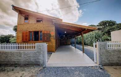 Imagem: A casa possui 2 Dormitórios, 1 Banheiro, 1 Vaga na garagem