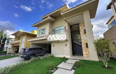 Imagem: A casa possui 5 Dormitórios, 5 Banheiros, 4 Vagas na garagem