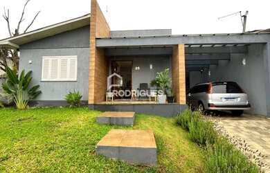 Imagem: A casa à venda possui 3 Dormitórios, 2 Banheiros, 2 Vagas