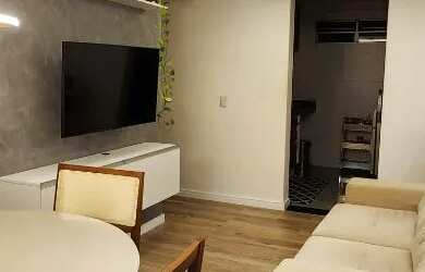 Imagem: O apartamento possui 2 Dormitórios, 1 Banheiro, 1 Vaga na garagem