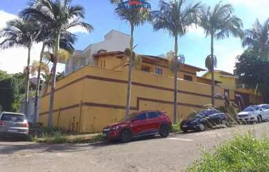 Imagem: A casa possui 3 Dormitórios, 2 Banheiros, 3 Vagas na garagem