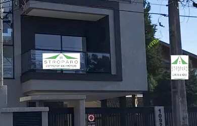 Imagem: A casa possui 3 Dormitórios, 3 Banheiros, 3 Vagas na garagem