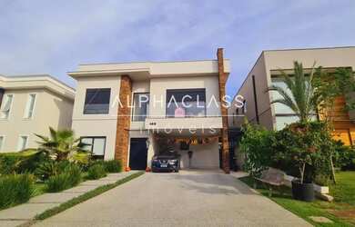 Imagem: A casa em condomínio possui 4 Dormitórios, 5 Banheiros, 2