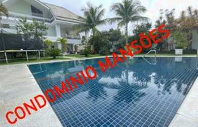 Imagem: A casa em condomínio possui 5 Dormitórios, 5 Banheiros, 4