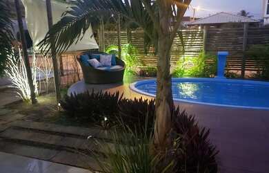 Imagem: A casa possui 3 Dormitórios, 2 Vagas na garagem e está localizado