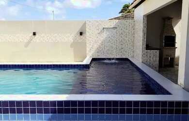 Imagem: A casa possui 3 Dormitórios, 3 Vagas na garagem e está localizado