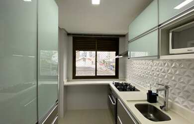 Imagem: O apartamento possui 3 Dormitórios, 2 Banheiros, 2 Vagas na