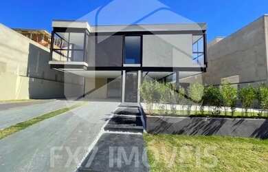 Imagem: A casa em condomínio possui 4 Dormitórios, 5 Banheiros, 2