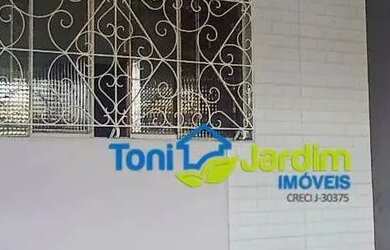 Imagem: A casa possui 3 Dormitórios, 3 Banheiros, 2 Vagas na garagem