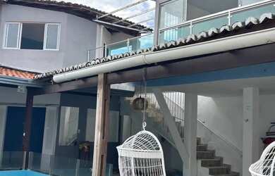 Imagem: A casa possui 5 Dormitórios, 5 Banheiros, 4 Vagas na garagem