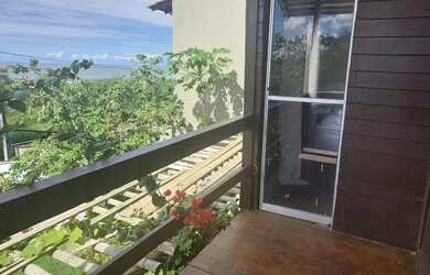 Imagem: A casa possui 4 Dormitórios, 2 Banheiros, 4 Vagas na garagem