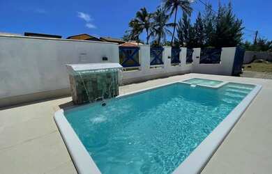 Imagem: A casa possui 5 Dormitórios, 5 Vagas na garagem e está localizado