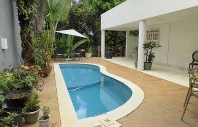 Imagem: A casa em condomínio possui 4 Dormitórios, 4 Banheiros, 5