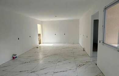 Imagem: A casa possui 3 Dormitórios, 2 Banheiros, 2 Vagas na garagem