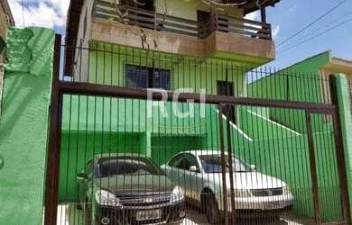 Imagem: A casa possui 4 Dormitórios, 4 Banheiros, 2 Vagas na garagem