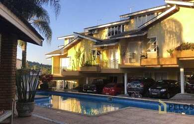 Imagem: A casa em condomínio possui 3 Dormitórios, 4 Banheiros, 3