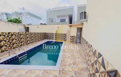 Imagem: A casa possui 2 Dormitórios, 2 Banheiros, 2 Vagas na garagem