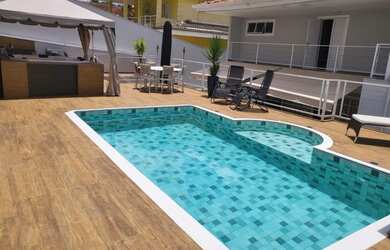 Imagem: A casa em condomínio possui 4 Dormitórios, 5 Banheiros, 4