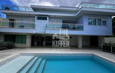 Imagem: A casa possui 5 Dormitórios, 5 Banheiros, 4 Vagas na garagem