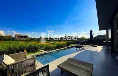 Imagem: A casa em condomínio possui 3 Dormitórios, 5 Banheiros, 4