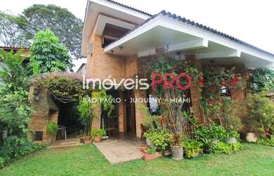 Imagem: A casa possui 4 Dormitórios, 5 Banheiros, 5 Vagas na garagem