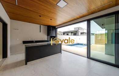 Imagem: A casa em condomínio possui 4 Dormitórios, 5 Banheiros, 4