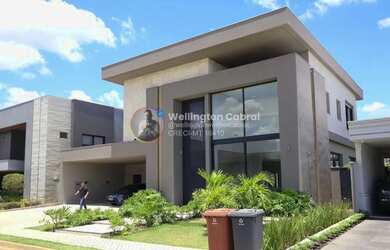 Imagem: A casa possui 4 Dormitórios, 5 Banheiros, 5 Vagas na garagem