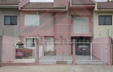 Imagem: A casa possui 3 Dormitórios, 2 Banheiros, 3 Vagas na garagem