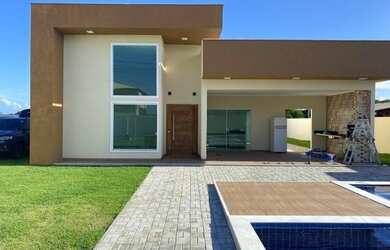 Imagem: A casa possui 4 Dormitórios, 4 Banheiros, 1 Vaga na garagem