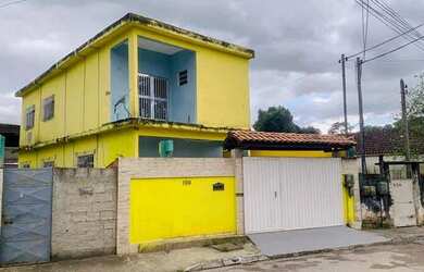 Imagem: A casa possui 3 Dormitórios, 2 Banheiros, 1 Vaga na garagem