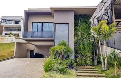 Imagem: A casa em condomínio possui 4 Dormitórios, 5 Banheiros, 4