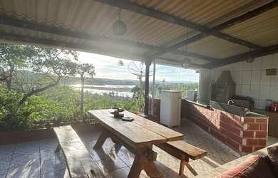 Imagem 2: Rancho vista pro lago. Acomodam 10 pessoas, 4 Vagas na garageme2 Dormitórios