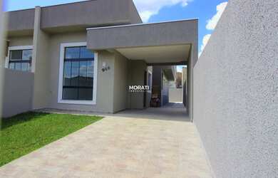 Imagem: A casa possui 3 Dormitórios, 2 Banheiros, 2 Vagas na garagem