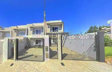 Imagem: A casa possui 3 Dormitórios, 2 Banheiros, 2 Vagas na garagem